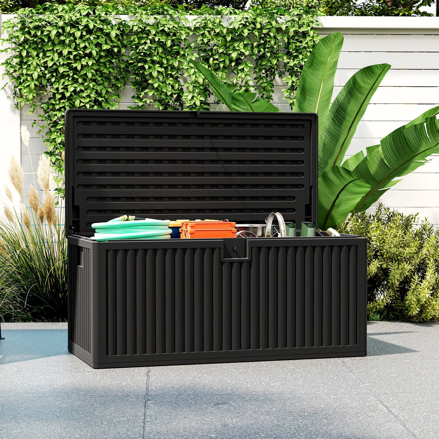 140 Gallon Deck Box, Fluted Resin Outdoor Storage Box with Gas Struts, Waterproof and UV Resistant Storage Container for Garden Tools and Pool Supplies, Black