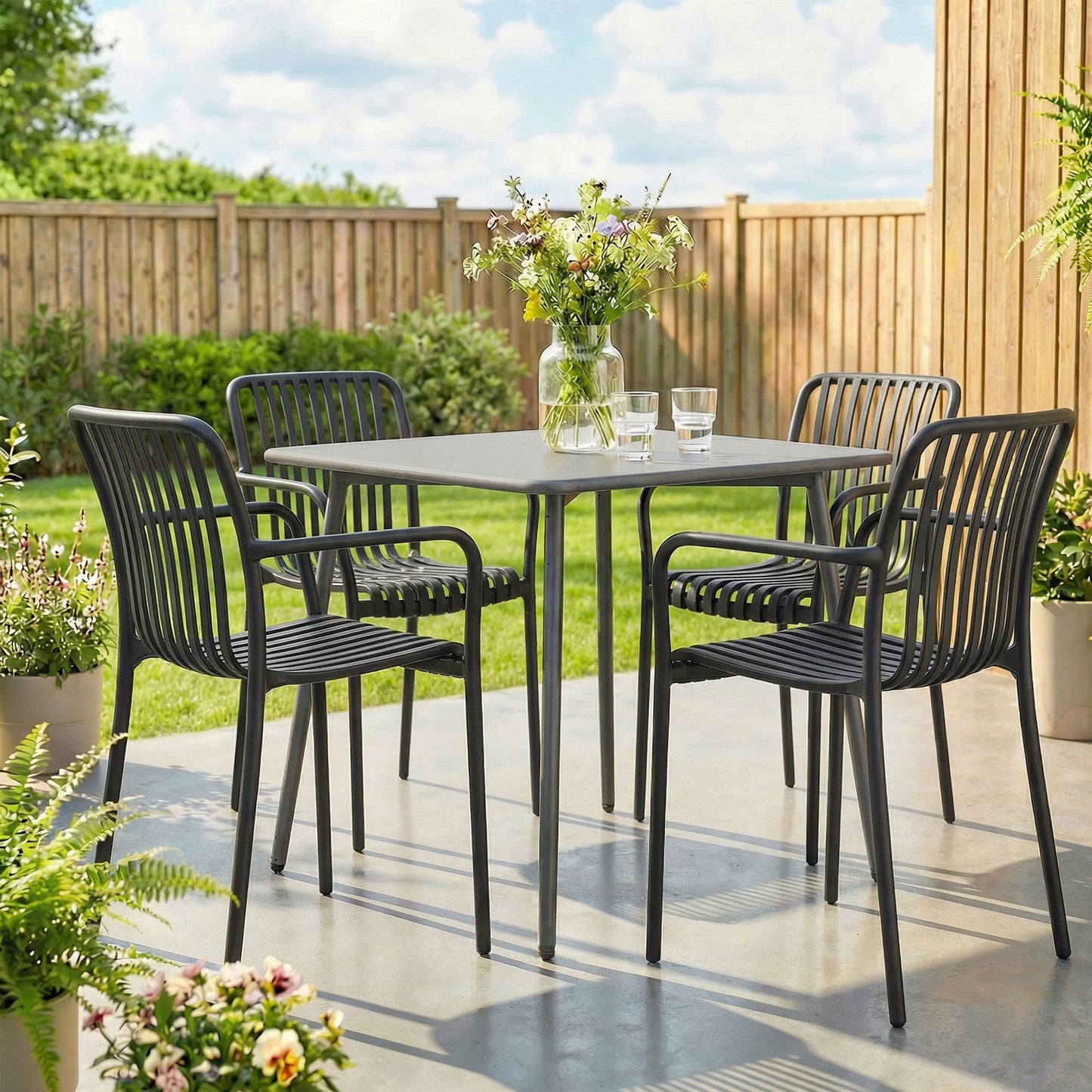 Stackable Patio Chairs Set of 4, Outdoor Patio Dining Chairs with Curved Backrest, Slatted Seat and Armrest for Indoor, Outdoor, Balcony, Deck, Garden,  Plastic, Black